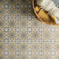 Geometric patterned floor tiles in cream mustard yellow and gray tones bolero yellow stone on chalk