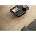 Bowland Oak light oak wood-effect plank tile with a natural grain