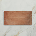 Brewhouse porcelain rectangle ceramic tile in terracotta with a matte slightly textured surface and rectangular shape