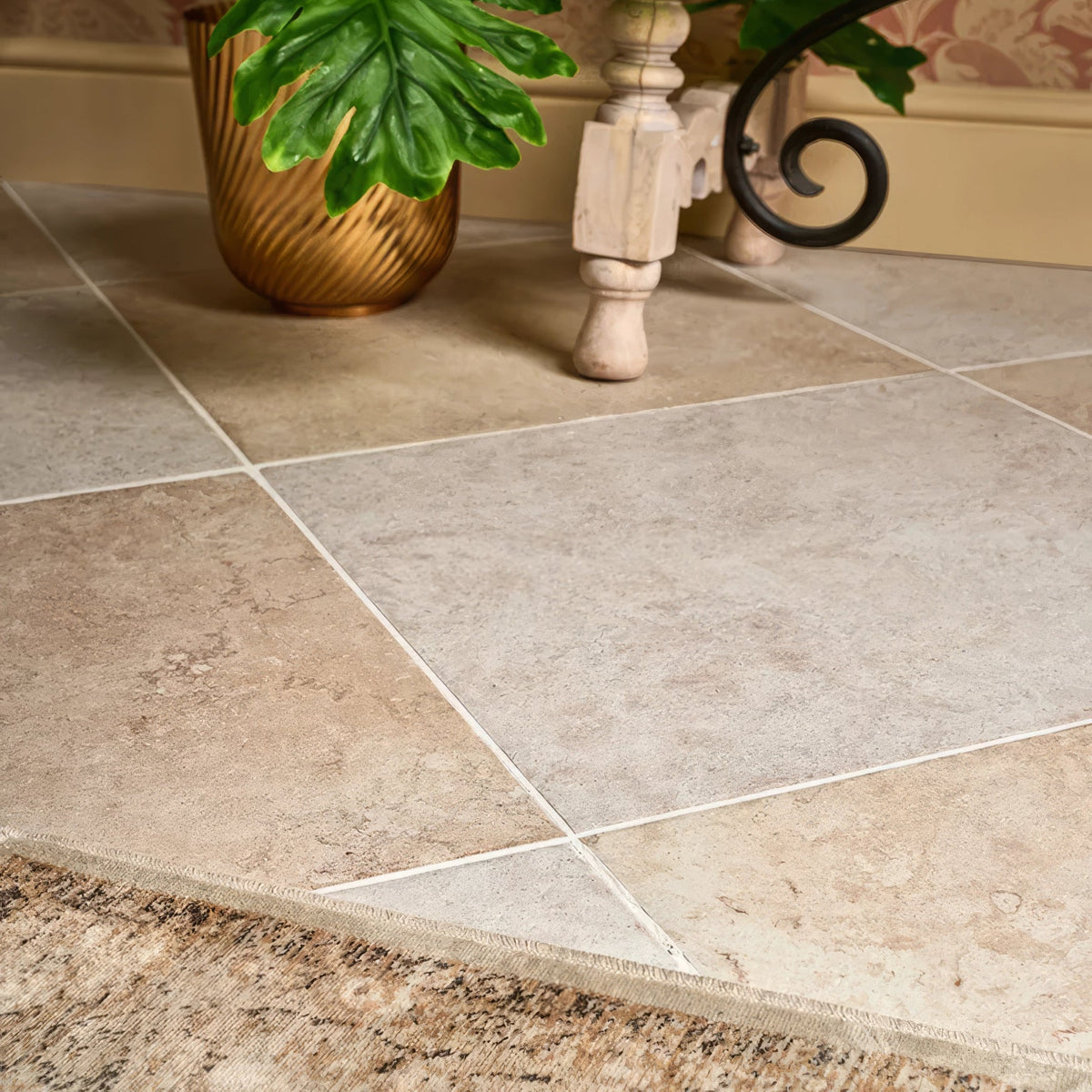 Beige stone-effect brit stone burford porcelain vinyl floor tiles with subtle natural veining and white grout lines