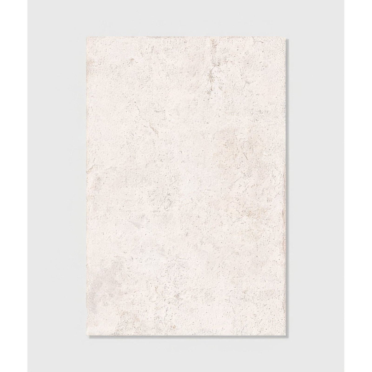 Brit stone minster porcelain tile 60 x 90cm in off-white with subtle marbled texture and faint gray veining