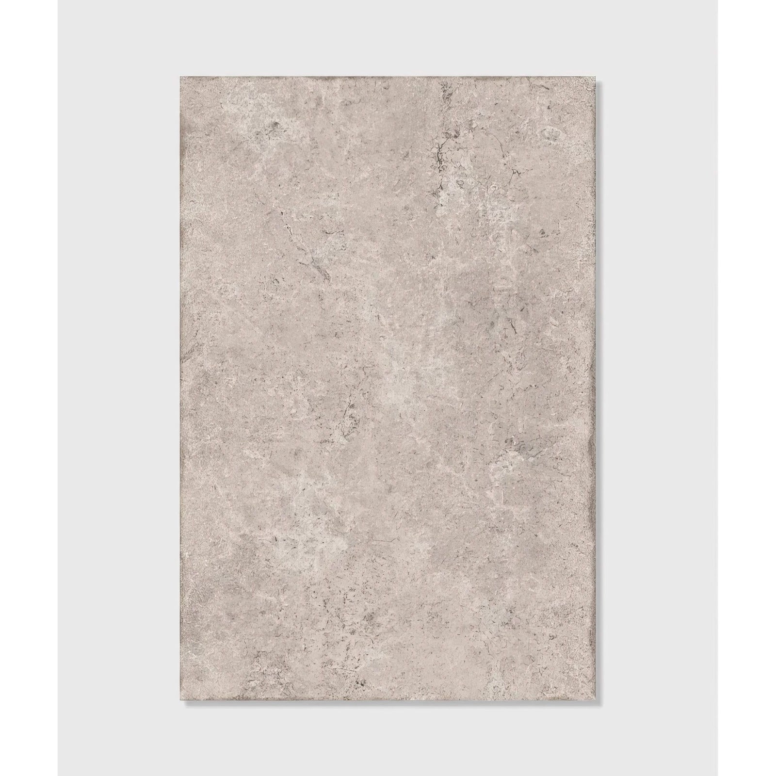 Gray stone-effect rectangular tile with a textured mottled surface brit stone pennant porcelain paving