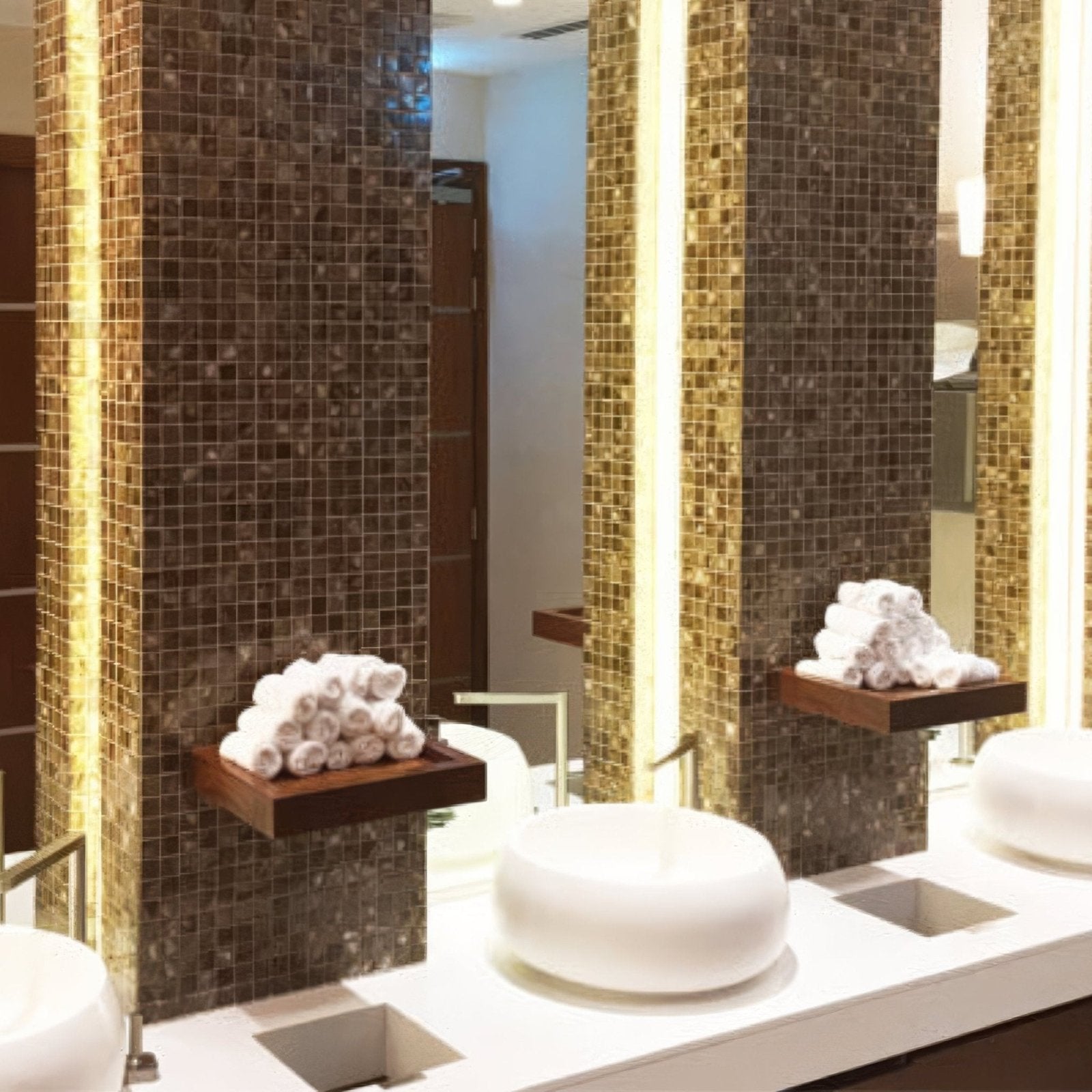 White ceramic vessel sink with smooth rounded design paired with bronze 25mm square faucet accessory