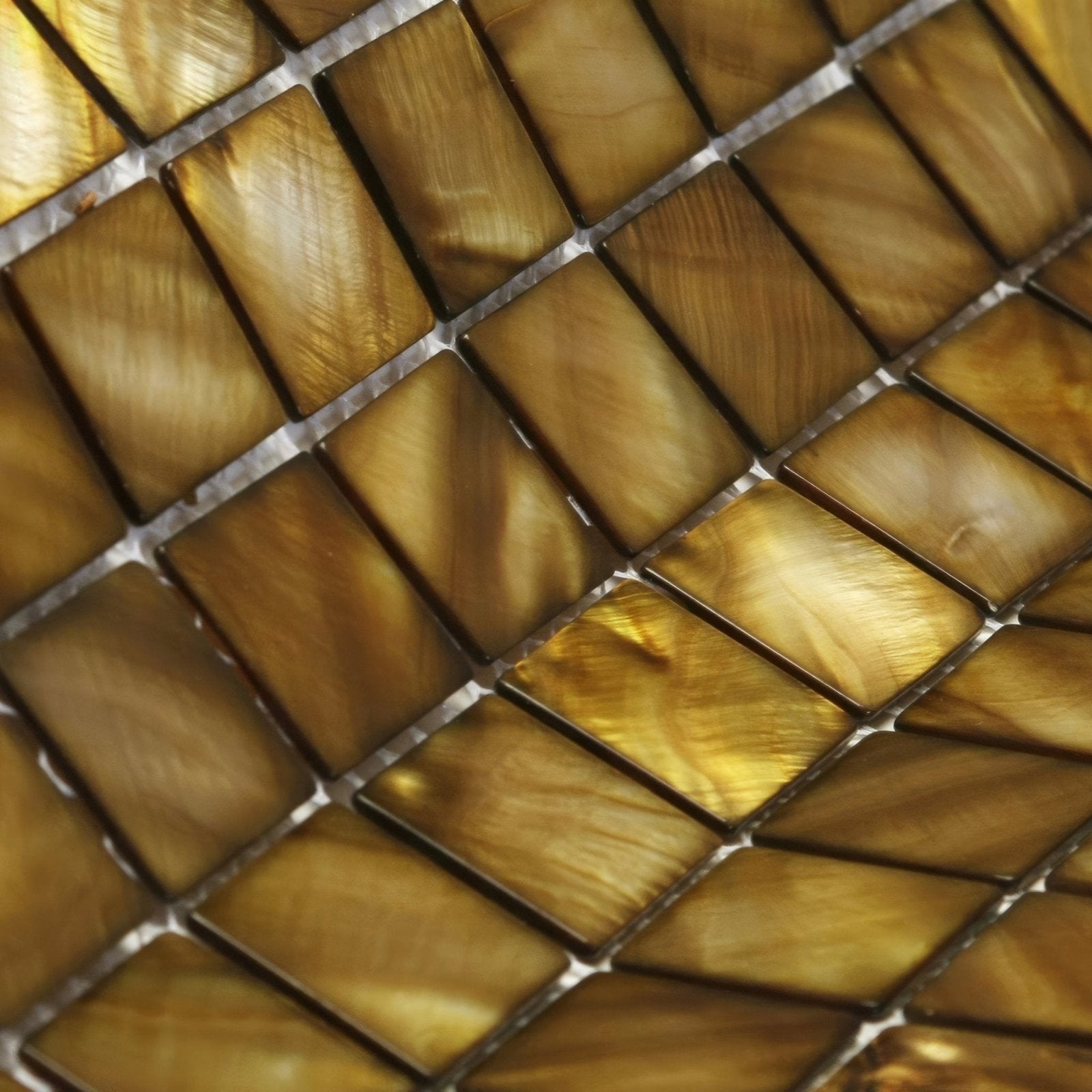 Golden iridescent bronze 25mm square mosaic tiles with glossy finish and subtle natural patterns