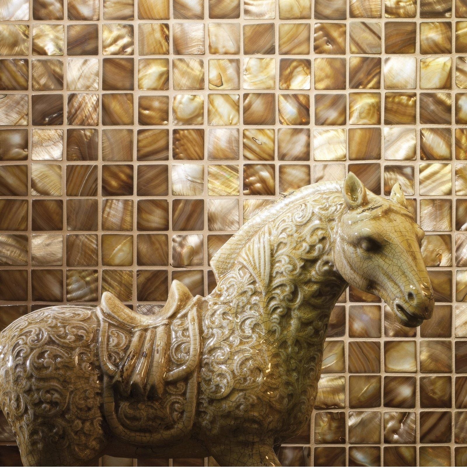 Bronze 25mm square featuring a detailed light beige ceramic horse figurine with intricate swirling patterns and saddle