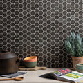 Dark gray burano grey hexagon recycled glass mosaic tile backsplash with white grout lines for kitchen walls