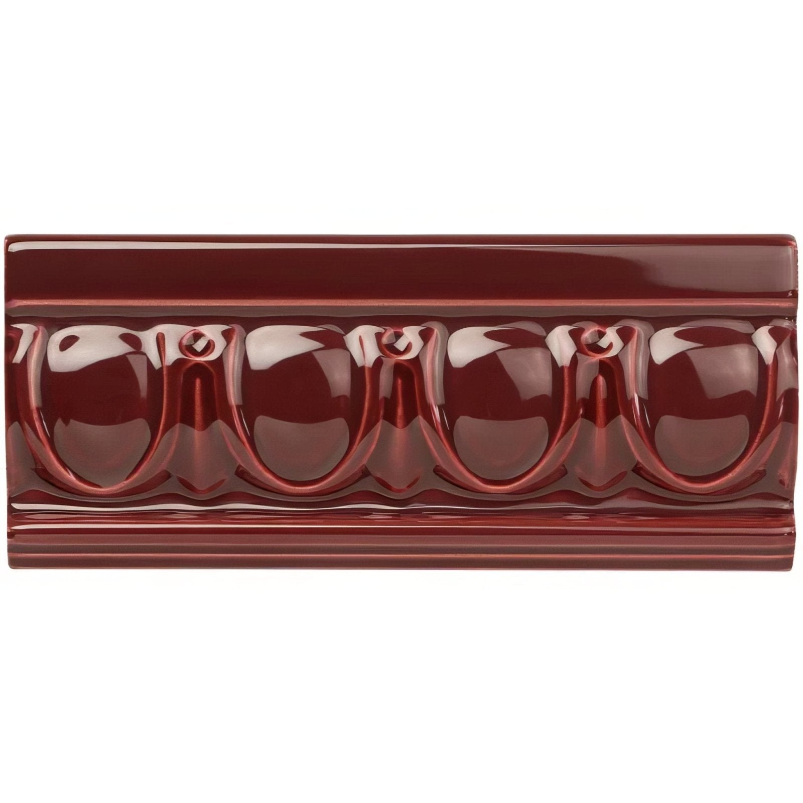 A glossy burgundy ceramic decorative tile with a repeating raised rounded arch pattern and subtle edge ridges