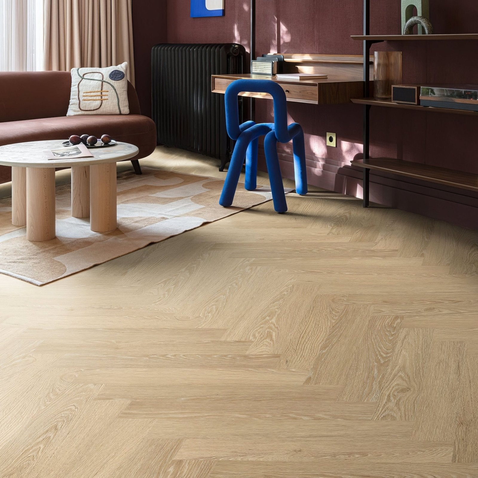 Buri f306 herringbone light-colored wood-plank flooring arranged in a classic herringbone pattern