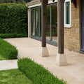 Buscot Limestone Tumbled & Etched beige floor tiles in an exterior setting