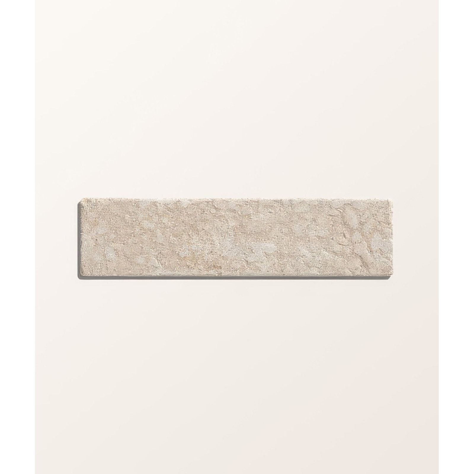 Beige rectangular buscot limestone tile with tumbled and etched textured natural surface for flooring use