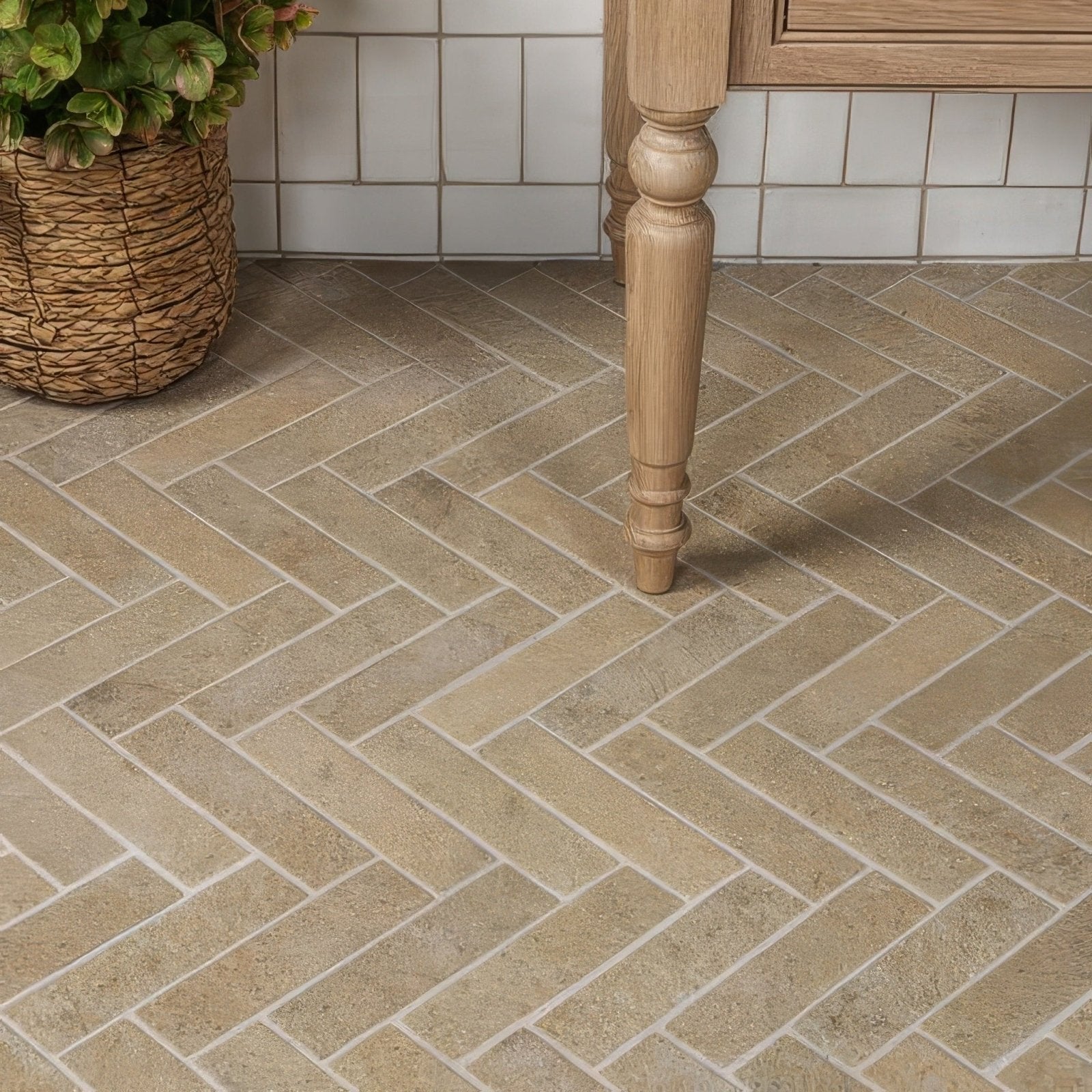 Beige herringbone patterned buscot porcelain parquet textured floor tiles with subtle stone-like texture
