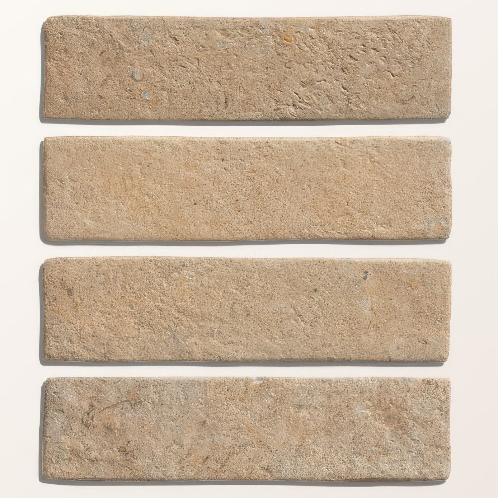 Four rectangular beige buscot porcelain parquet tiles with textured rustic surface for flooring and wall use