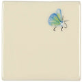 Cream-colored ceramic tile featuring a delicate hand-painted butterfly with translucent blue and green wings