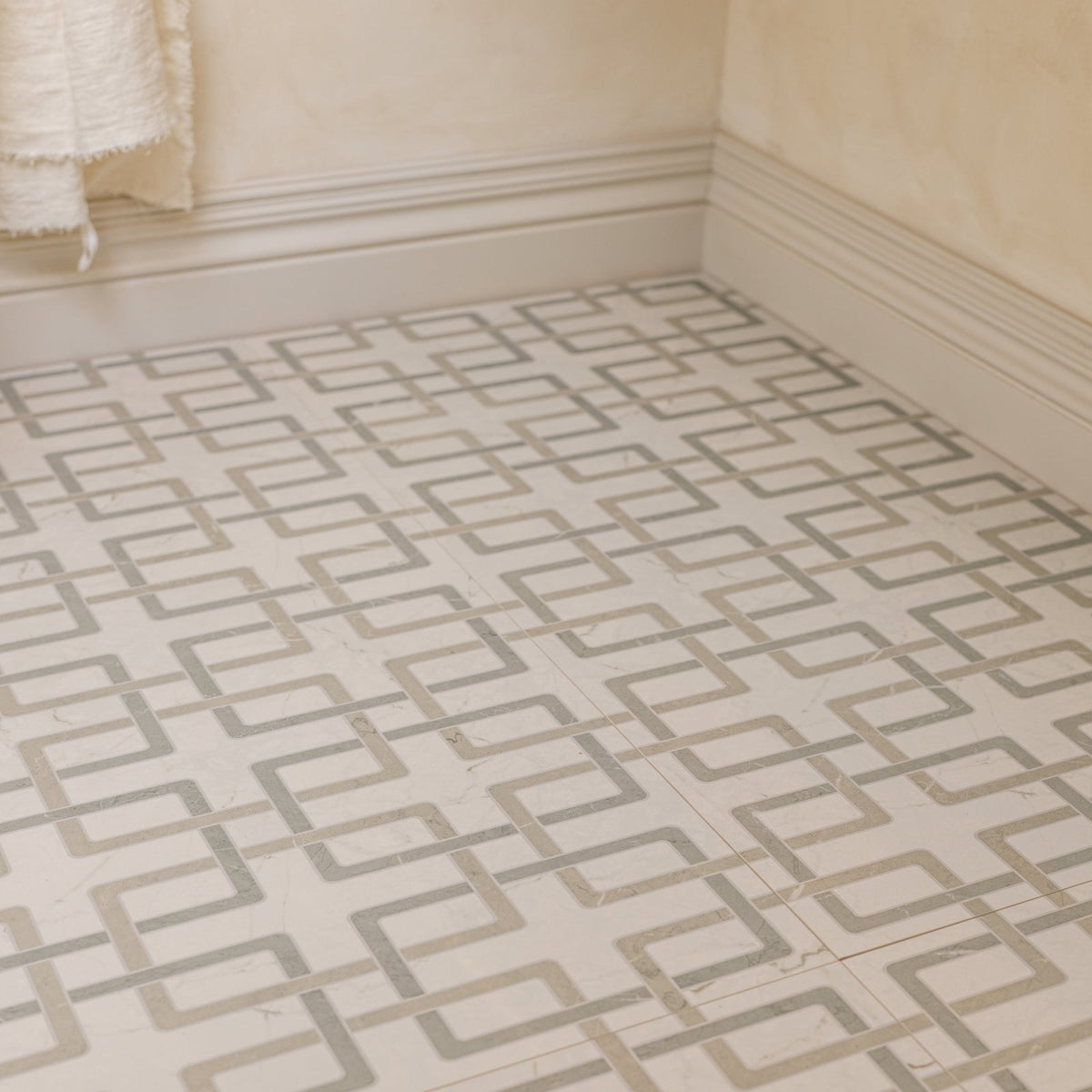 Byzantine porcelain forum sculpted beige and gray geometric patterned floor tiles with subtle marble-like finish
