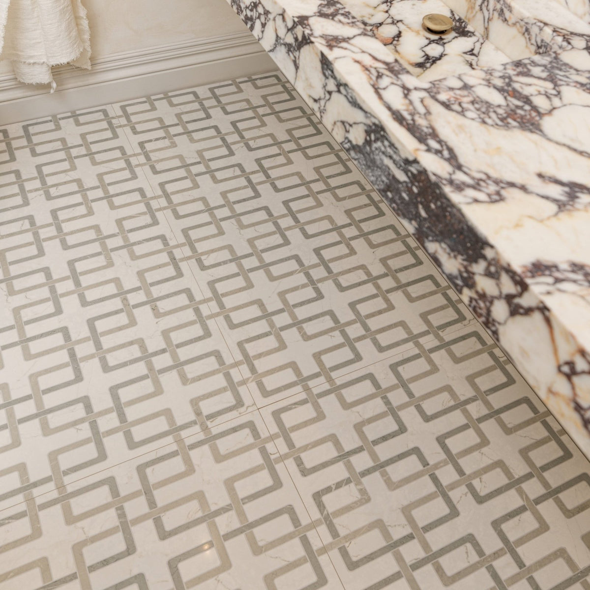 Byzantine porcelain forum sculpted floor tiles with beige and gray geometric interlocking square pattern