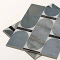 Modern mosaic tile panel with a geometric pattern of gray and white marble and black accents from Byzantine porcelain Lauro sculpted