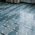 Byzantine porcelain lauro sculpted blue and white marble patterned oval floor tiles arranged in geometric design
