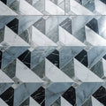 Byzantine porcelain seraph sculpted geometric mosaic tile pattern with interlocking white black and gray marble triangles