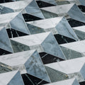 Byzantine porcelain seraph sculpted geometric mosaic tile featuring white black and gray marble triangular pieces