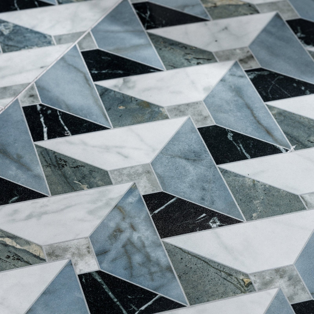 Byzantine porcelain seraph sculpted geometric mosaic tile featuring white black and gray marble triangular pieces