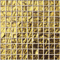 Byzantium gem gold rush glass mosaic featuring golden textured glass tiles with metallic sheen and dark veining