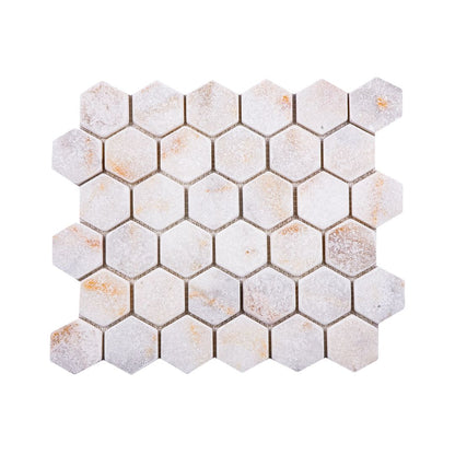 Calacatta Sugar tumbled marble hexagon mosaic sheet in white marble with warm gold veining and softened edges