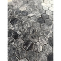 Platinum Black polished marble hexagon mosaic used as a dark bathroom wall