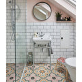 White ceramic pedestal sink with chrome metal legs from cabana porcelain new orleans collection