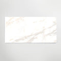 Calacatta gold polished porcelain tiles with white marble effect and subtle gray veining in rectangular shape
