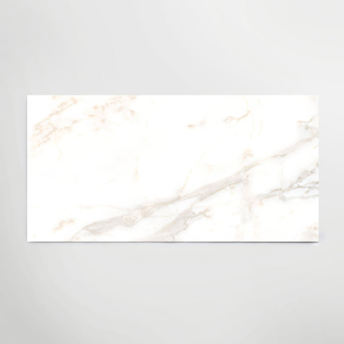 Calacatta gold polished porcelain tiles with white marble effect and subtle gray veining in rectangular shape