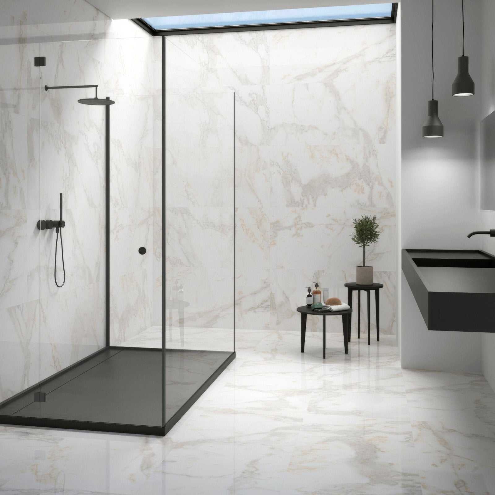 Calacatta Gold Polished Porcelain Tiles white marble-effect porcelain tiles in a black-framed glass shower enclosure