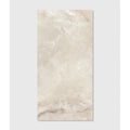 Cream-colored california porcelain beige marble tile with subtle veining and polished reflective surface