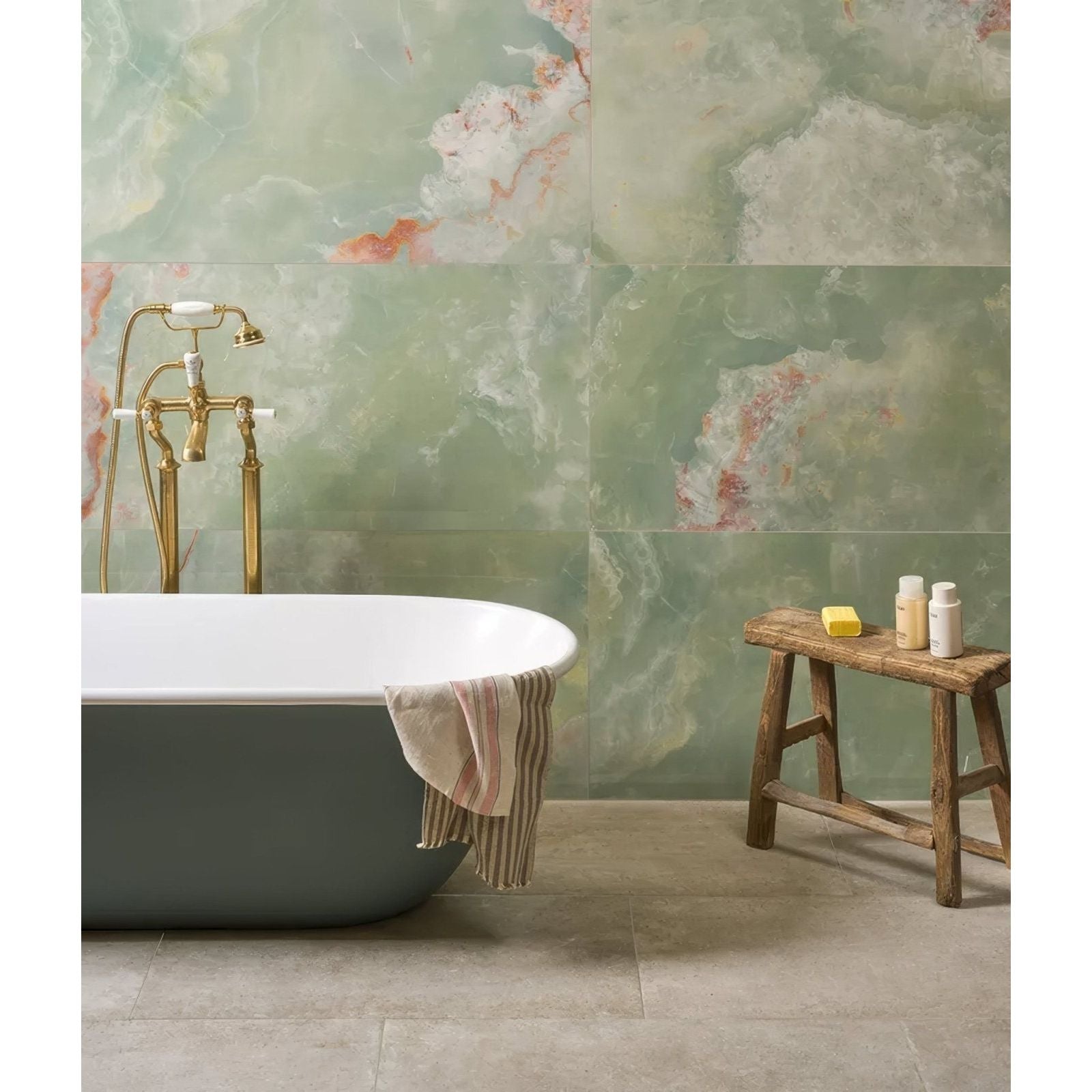 California Porcelain Jade green marble-effect tiles with a freestanding bathtub