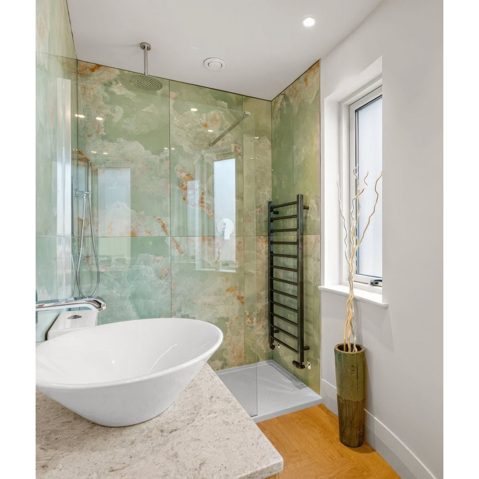 California Porcelain Jade green marble-effect tiles with a white oval basin