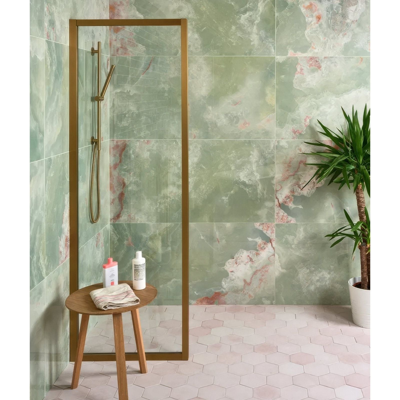 California Porcelain Jade green marble-effect tiles with a gold-framed glass shower enclosure