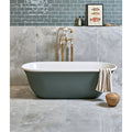 California Porcelain Pearl white marble-effect tiles with a sage green freestanding bathtub