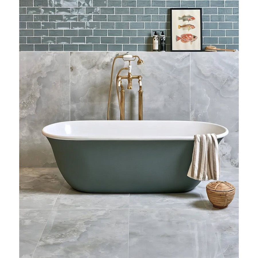 California Porcelain Pearl white marble-effect tiles with a sage green freestanding bathtub