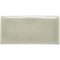 A sleek rectangular ceramic canvas half tile with a smooth glossy off-white finish