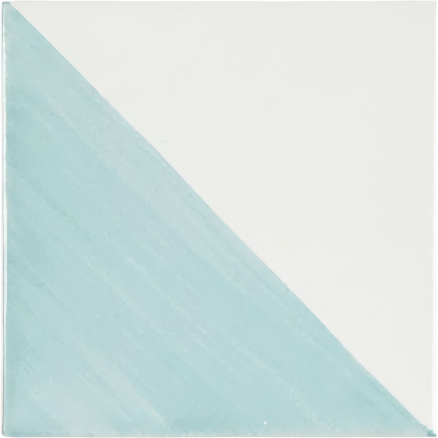 Capri Lagoon hand painted ceramic tile with a diagonal split in soft mint green and off-white colors
