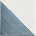 A square ceramic Capri Ocean hand painted tile with a diagonal split in matte gray blue and off white colors