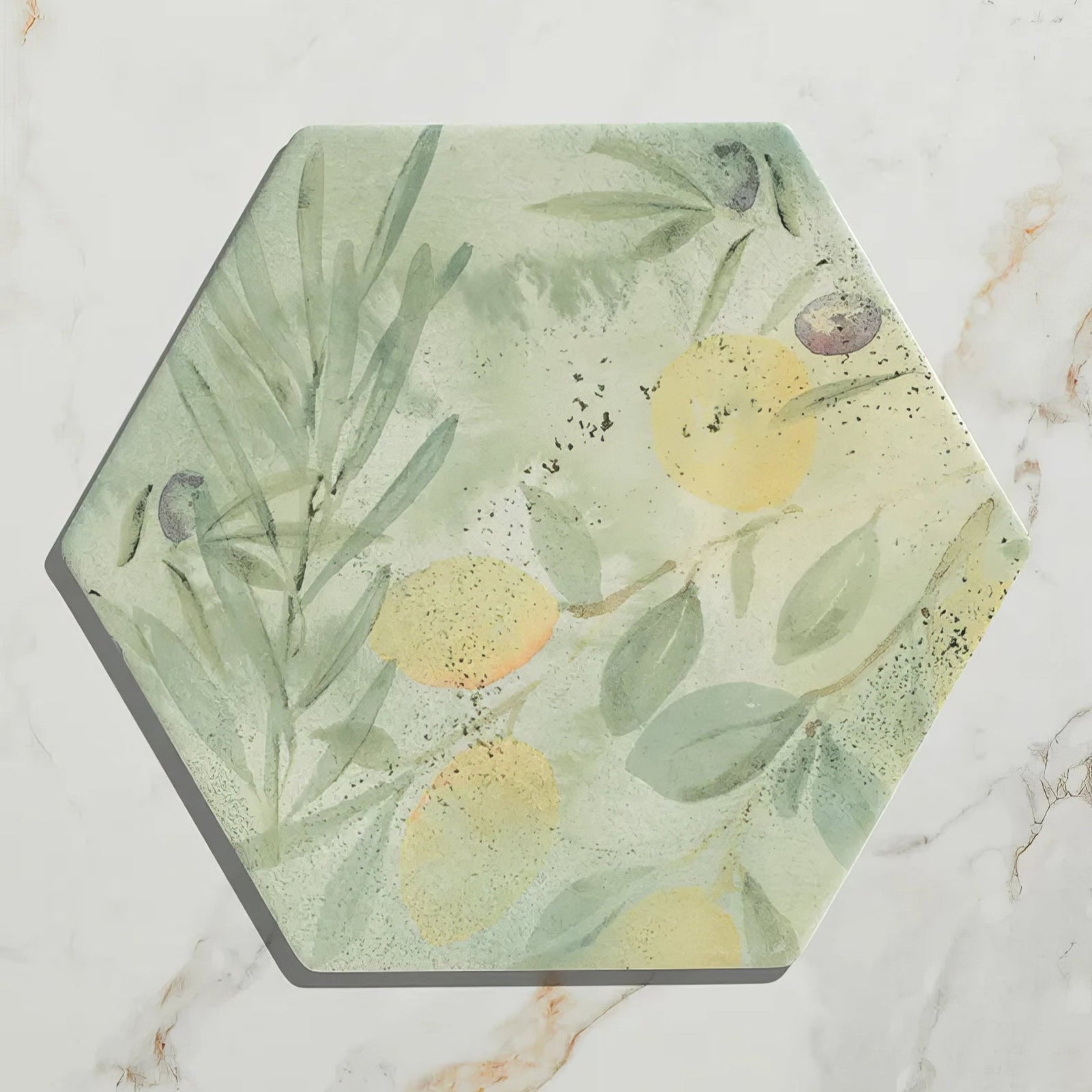 A hexagonal capri porcelain tile with a soft green and yellow watercolor lemon and olive design