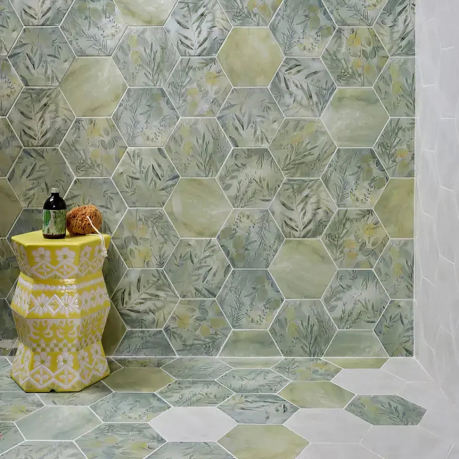 Yellow ceramic pedestal with white floral and geometric patterns from Capri Porcelain for decorative display