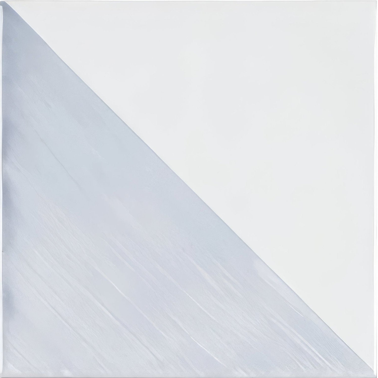 Capri sea mist hand painted tile with a sleek brushed silver metallic surface and diagonal light to dark gray gradient