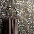 Carinthia Earth and Fire Mixed Mosaics grey, black and iridescent blue mosaic with a black towel ring and grey towel