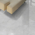 Light gray marble-effect polished porcelain floor tiles with subtle veining carrara gioia 120 x 120cm