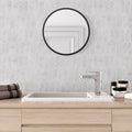 Carrara White Marble Picket Mosaic Tile white marble picket mosaic with a round black-framed mirror
