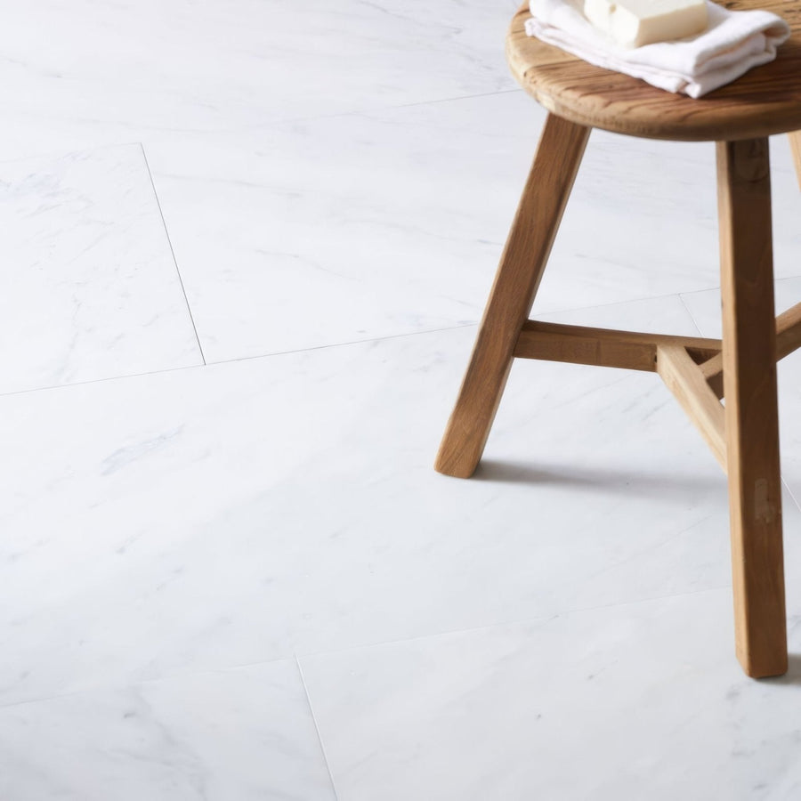 Carrara white marble tile 30.5 x 61cm with white marble-effect floor tiles and subtle gray veining