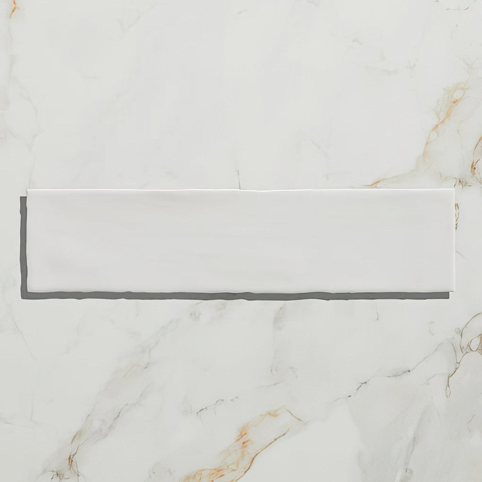Carter ceramic white is a sleek rectangular white ceramic tile with a smooth glossy finish on a marble surface