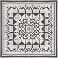 Black and white ceramic casino dealer corner tile with intricate symmetrical geometric pattern design