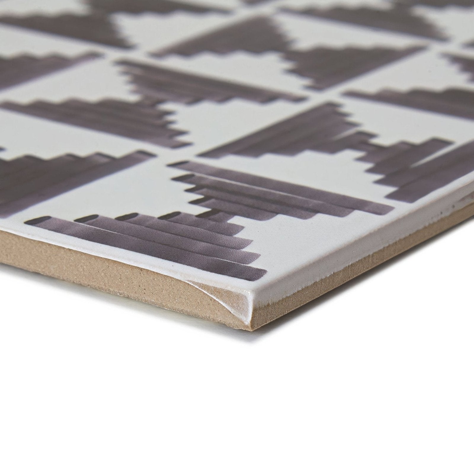 White ceramic casino poker patterned tile with dark gray geometric angular shapes and horizontal lines